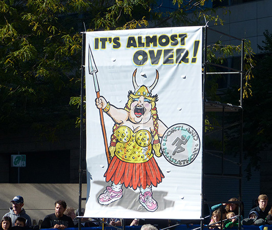 "It's Almost Over" sign near finish of Portland Marathon 2013