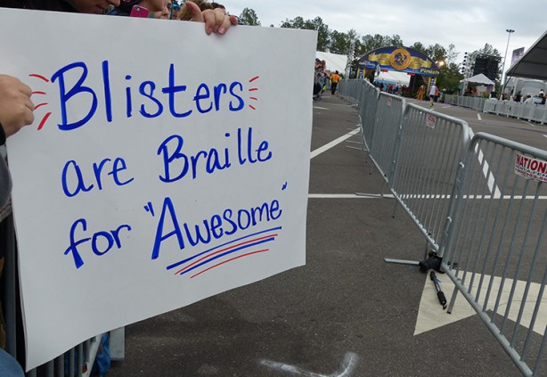 Blisters spectator sign at Walt Disney World Marathon