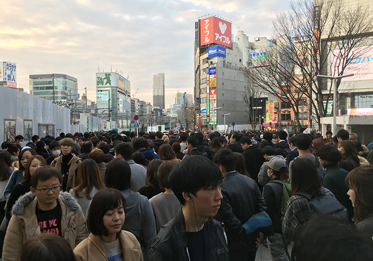 Crowds outside Shinjuku station in Tokyo
