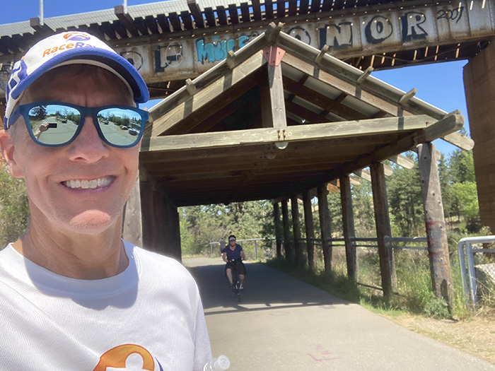 Covered bridge-like structure under the train bridge at mile 26 of the Windermere Marathon
